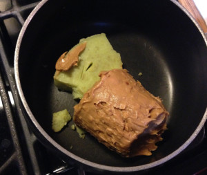 Melting the cannabutter and peanut butter.